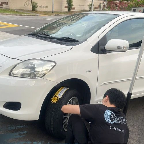 Swifty Tyre Specialist Fixing Flat Tyre